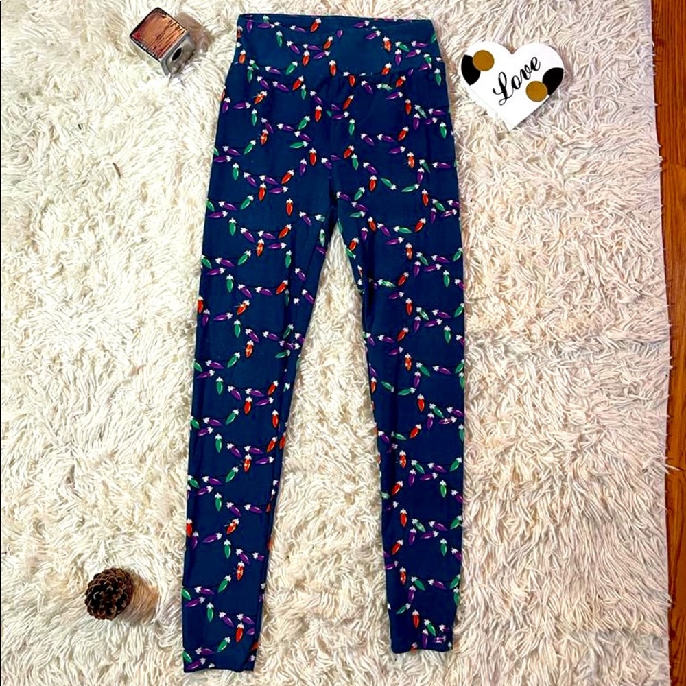 LEGGIN LULAROE SIZE 8 COLOR BLUE NAVY WITH PRINTS OF COLORED BULBS